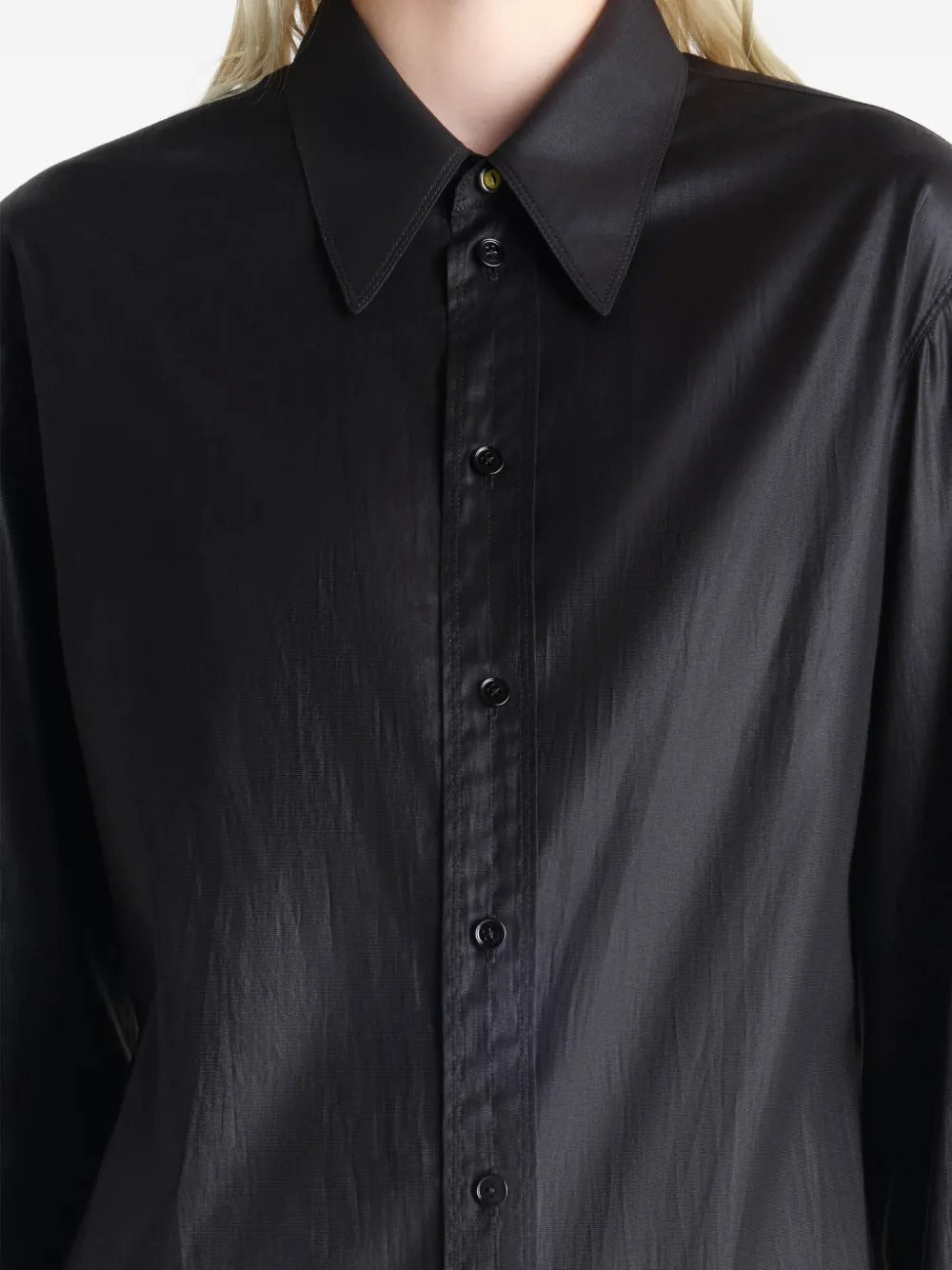 Close up of a black shirt, showing texture of the silk fabric