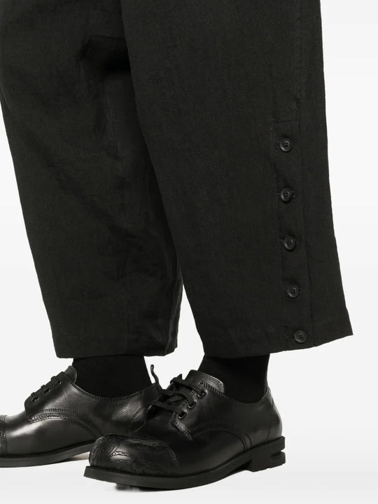 Close up of black pants, showing texture of the flax fabric