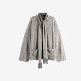 Grey knitwear, front view