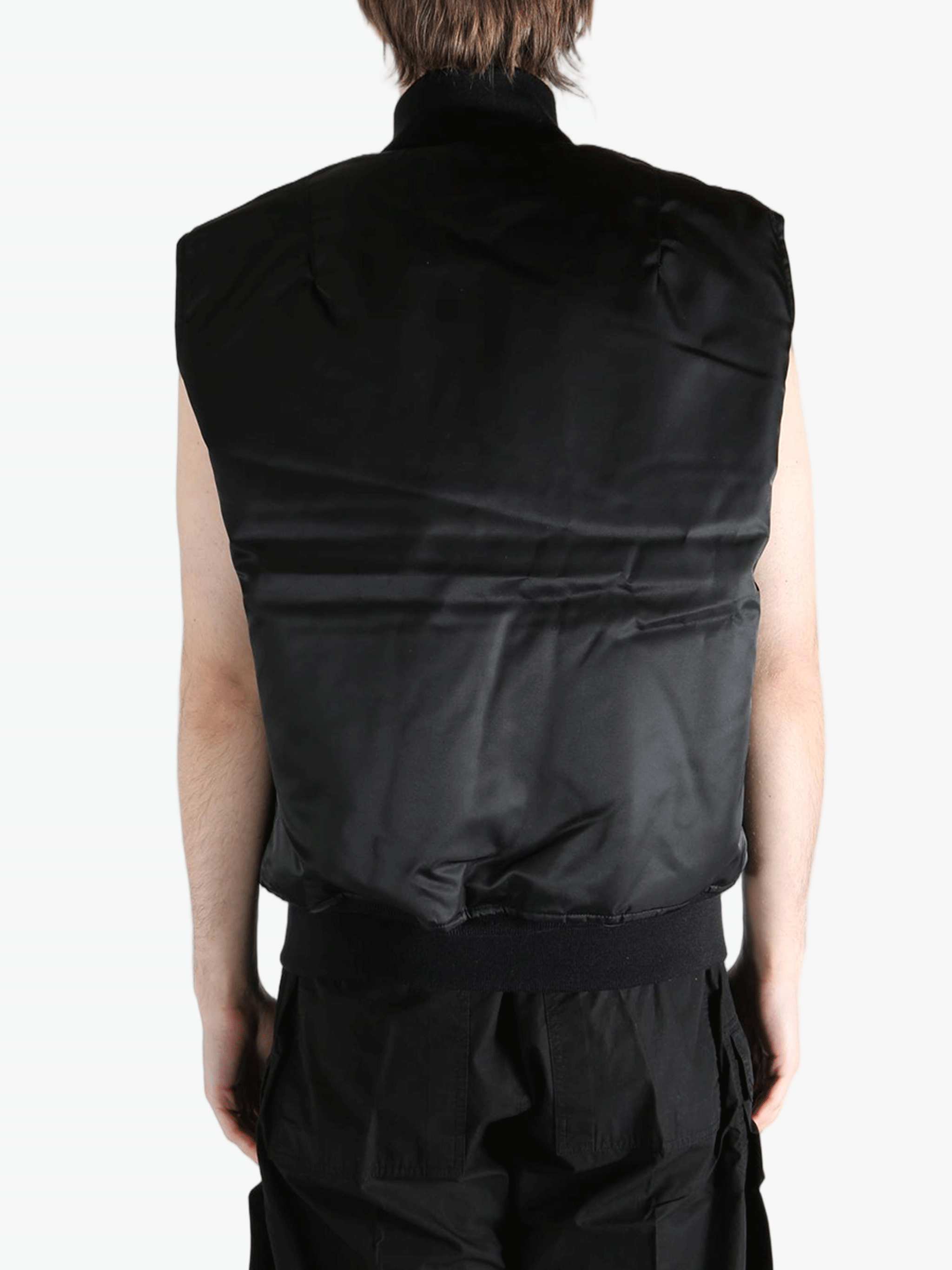 black jackets-coats worn by a person, showing the jackets-coats fit