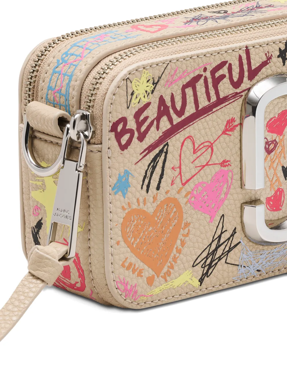 close up of white bags, showing texture of the cow leather fabric