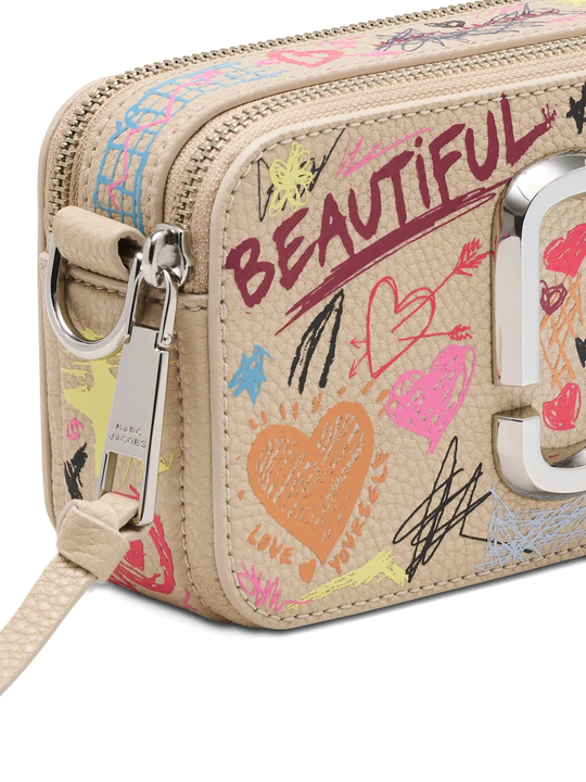 close up of white bags, showing texture of the cow leather fabric