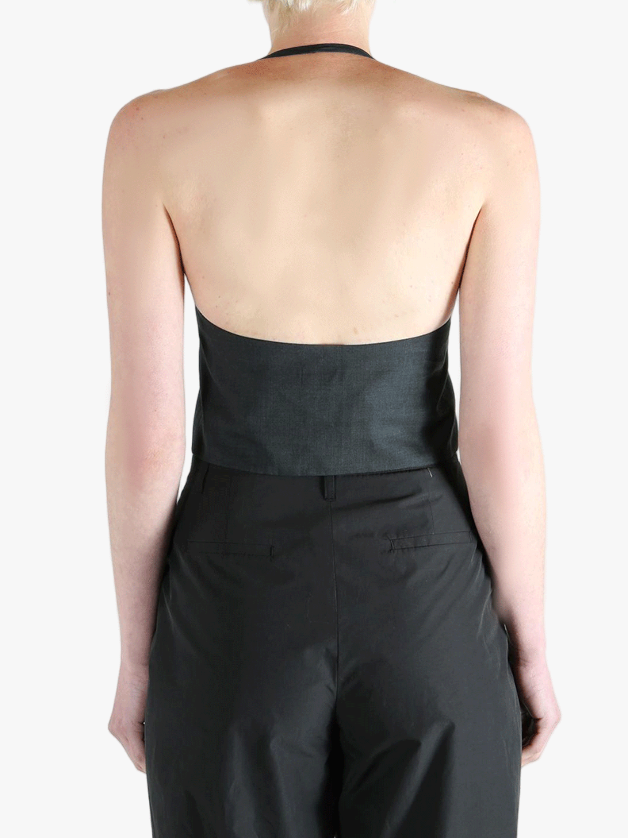 Black top worn by a person, showing the top's fit