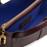 Close up of Burgundy bag, showing detail
