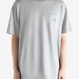 Grey t-shirts worn by a person, showing the t-shirts fit