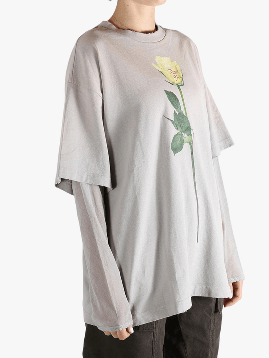 Grey T-shirt worn by a person, showing the T-shirt's fit