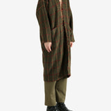 Green coat, full body view