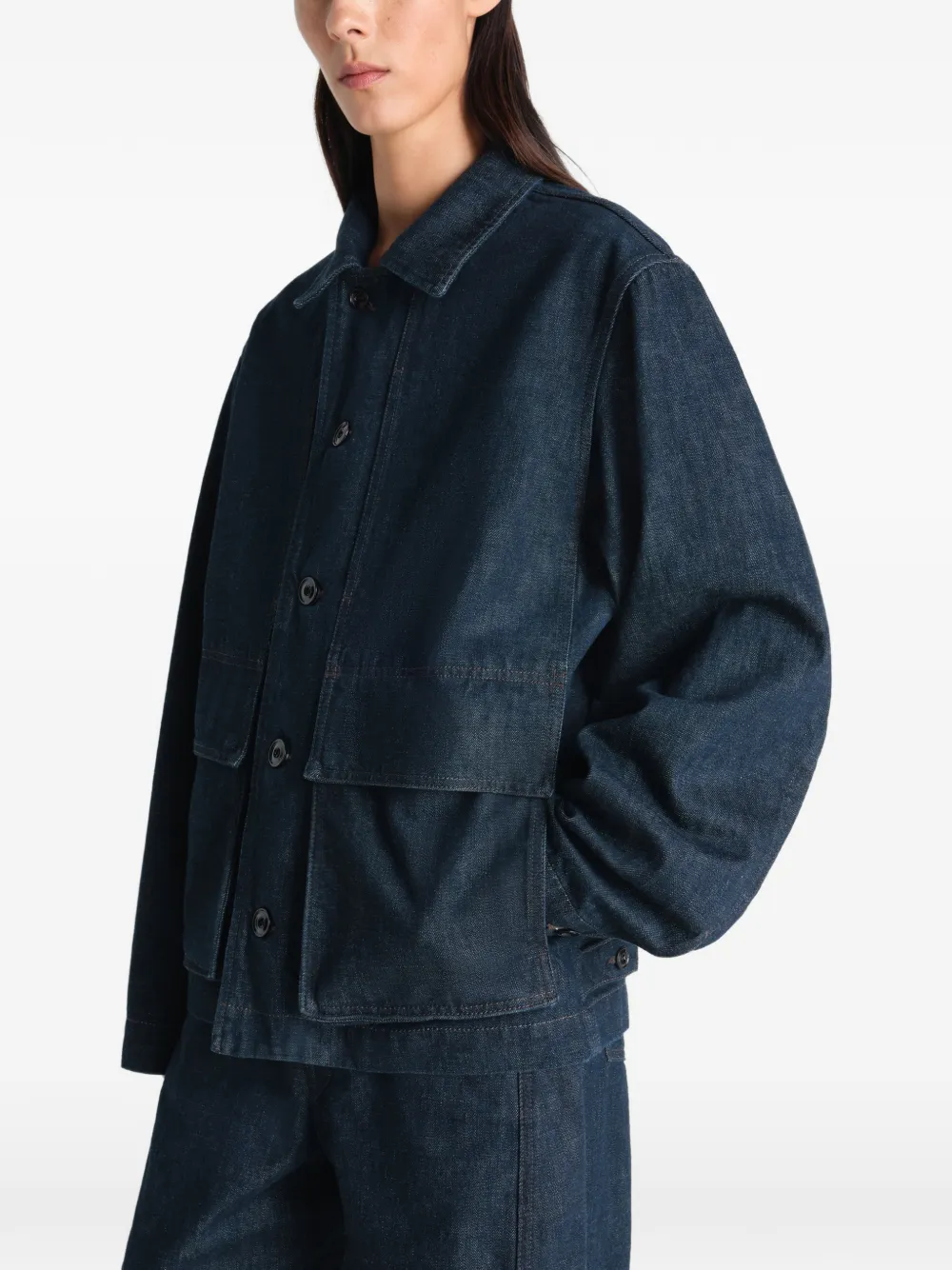 Blue jacket worn by a person, showing the jacket's fit