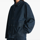 Blue jacket worn by a person, showing the jacket's fit