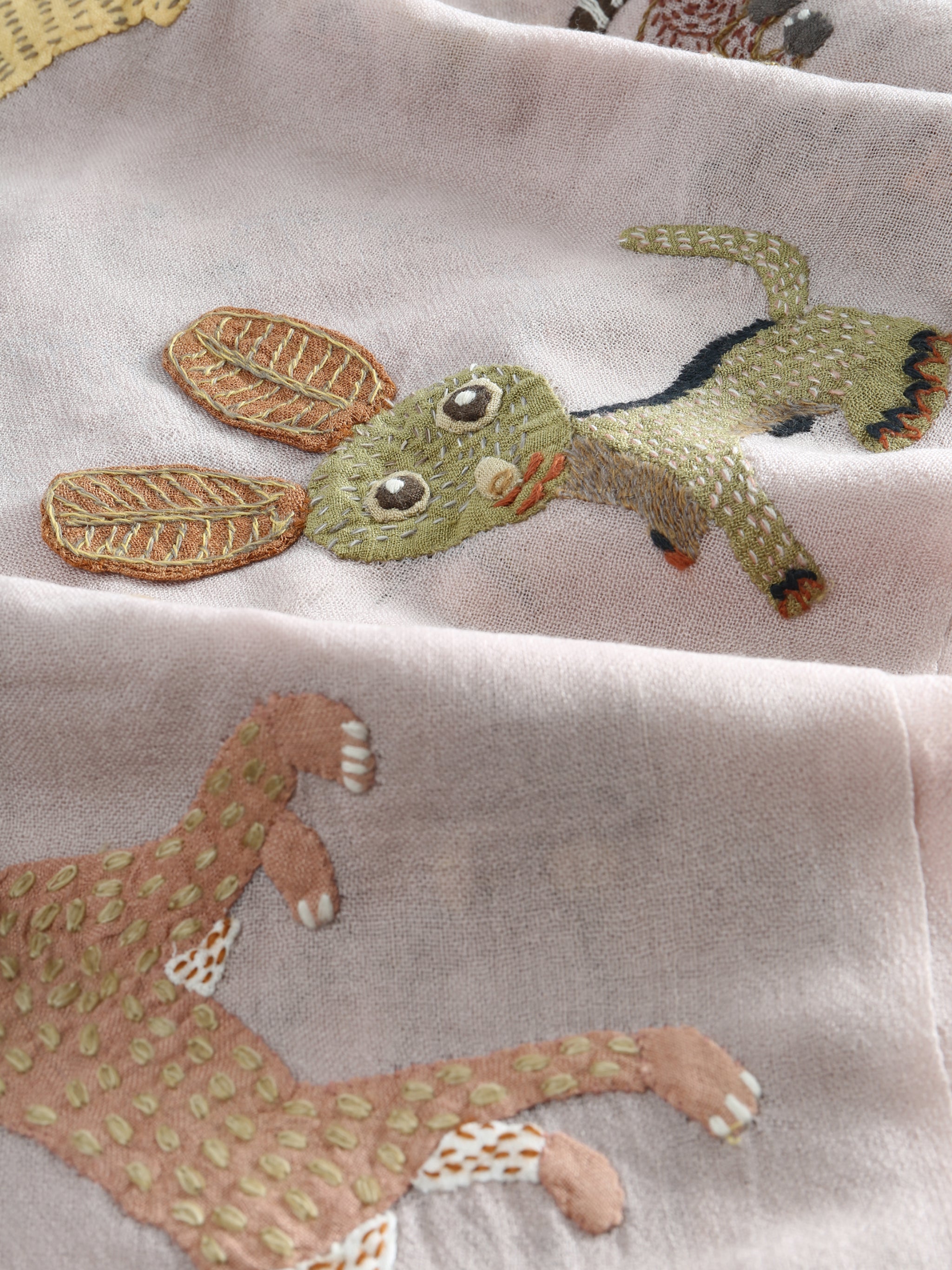 Close up of white scarf,showing texture of the wool fabric