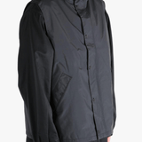Black top worn by a person, showing the top's fit