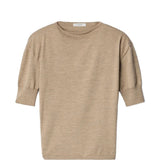 Tan knitwear, front view