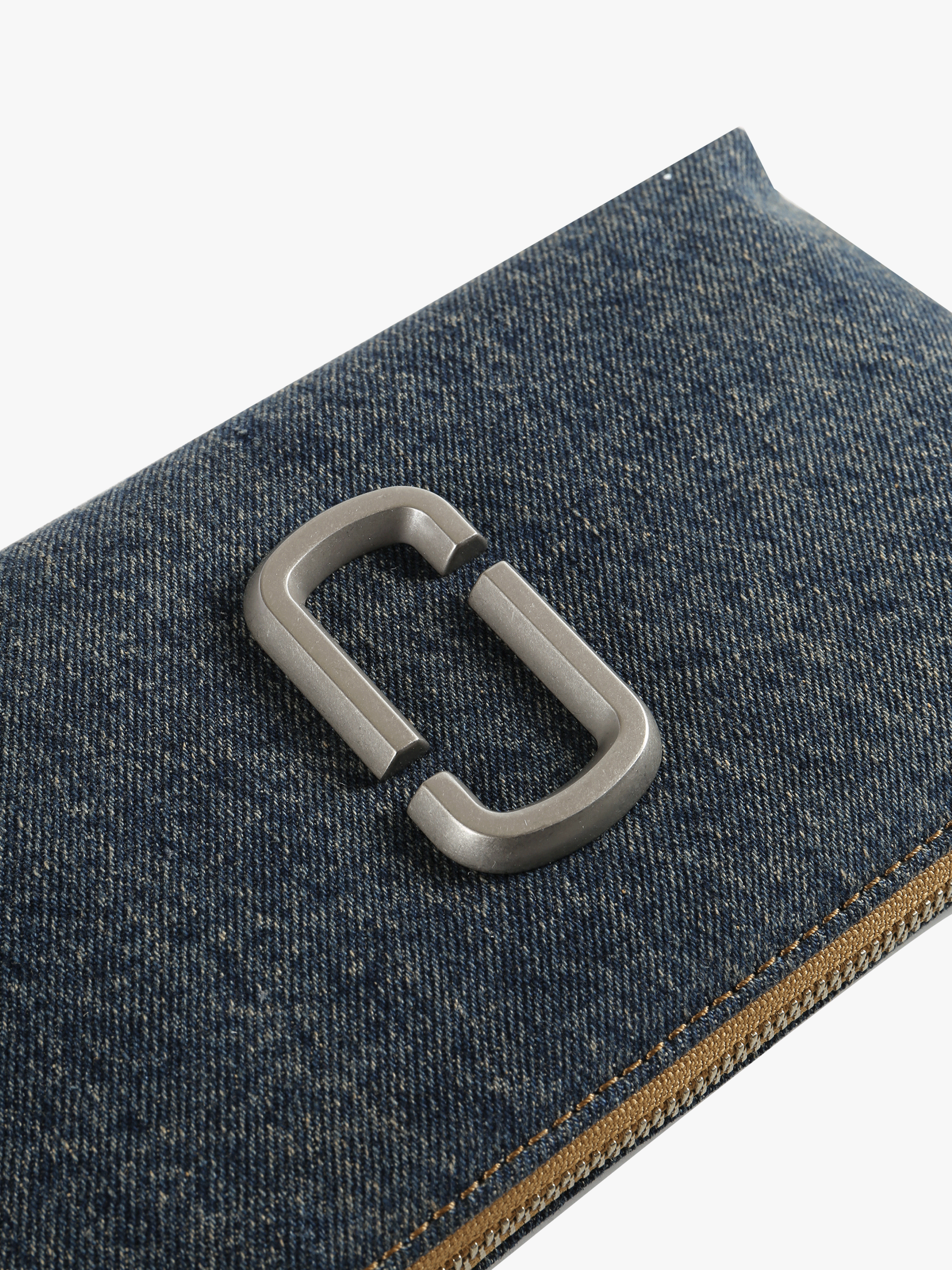 Close up of navy bags, showing texture of the fabric