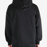 Black hoodie worn by a person, showing the hoodie's fit