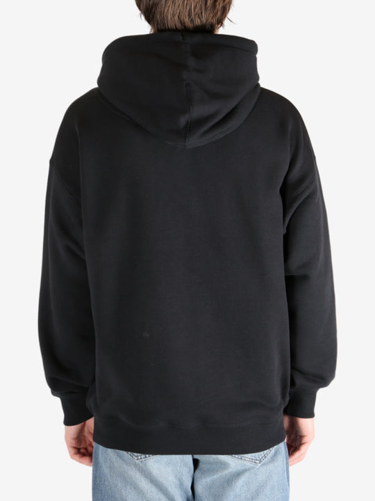 Black hoodie worn by a person, showing the hoodie's fit
