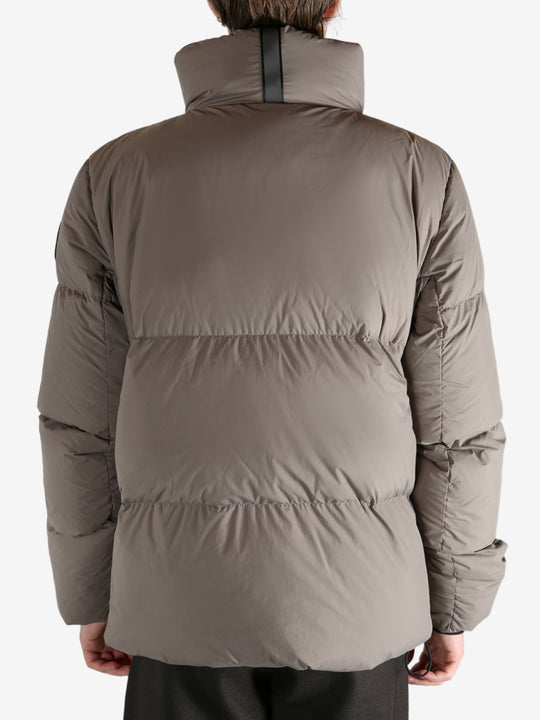 Grey jacket worn by a person, showing the jacket's fit