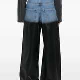 blue jeans worn by a person, showing the jeans fit