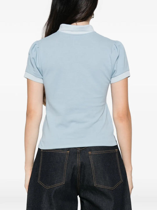 Blue top, full body view
