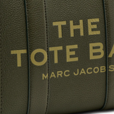 Close up of green bags, showing brand logo