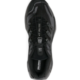 Black sneakers, vertical view