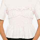 Close up of pink t-shirt,, showing texture of the Cotton fabric