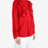 Red shirt worn by a person, showing the shirt fit