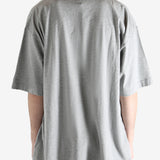 Grey t-shirt worn by a person, showing the t-shirt's fit