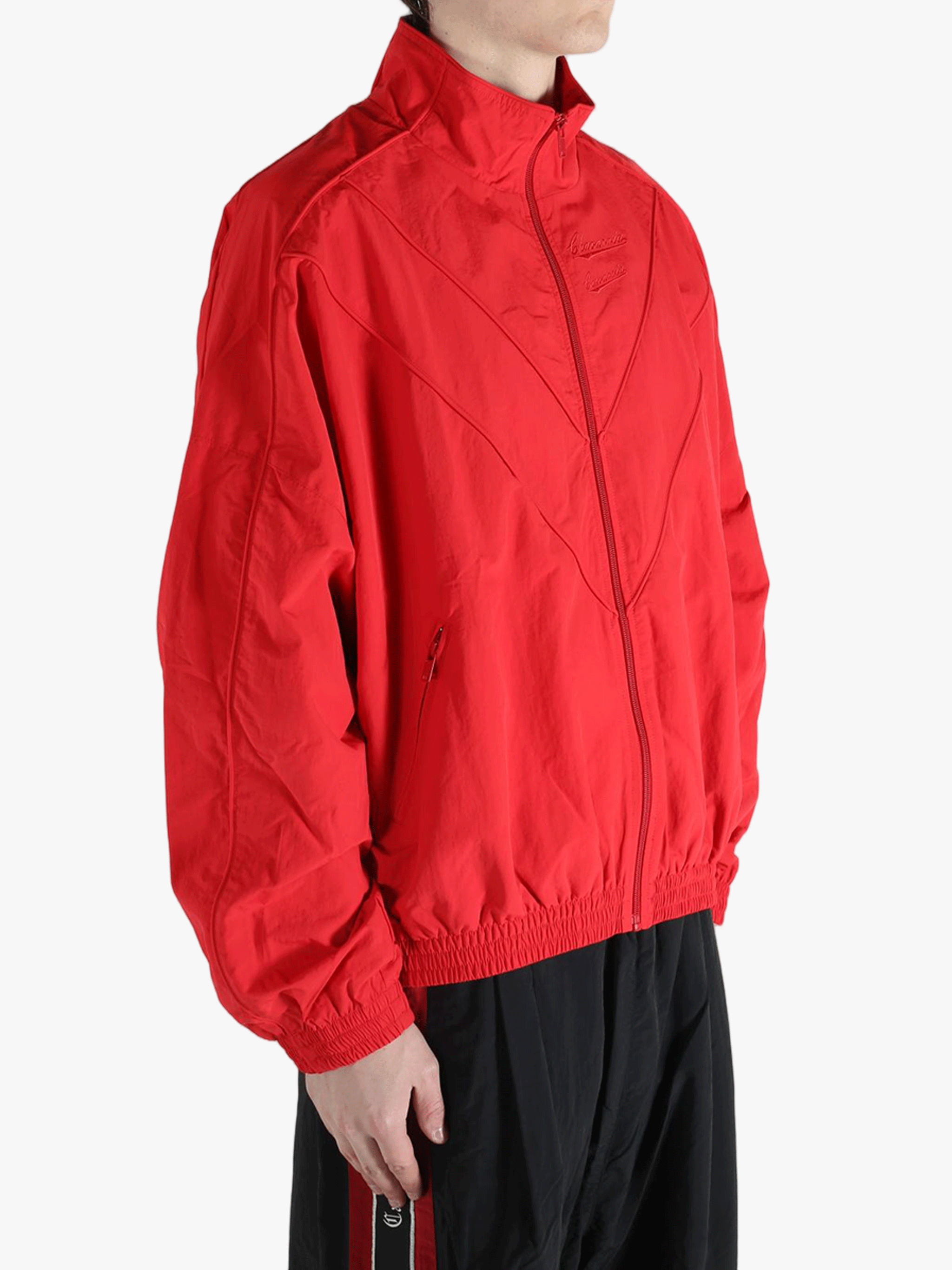Red jacket worn by a person,showing the jacket fit