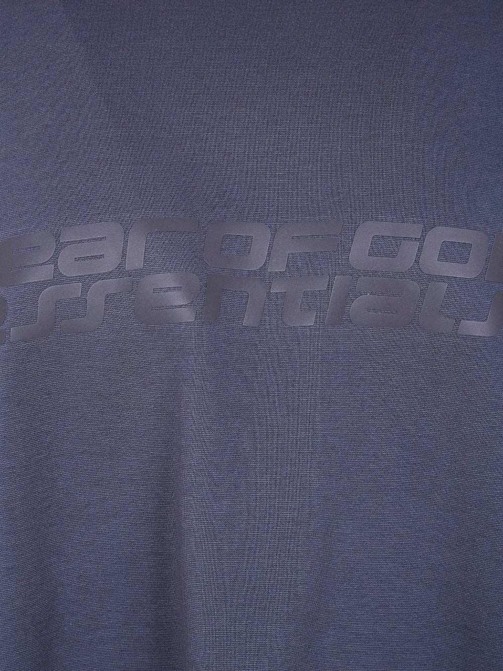 Close up of blue t-shirt, showing the texture of the cotton fabric