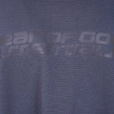 Close up of blue t-shirt, showing the texture of the cotton fabric