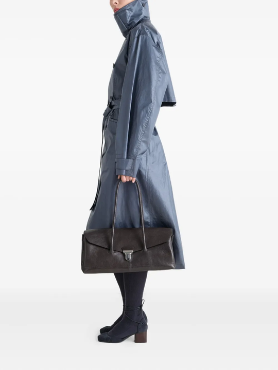 Black bag worn by a person, showing the bag's fit