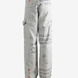 Grey pant worn by a person, showing the pant's fit