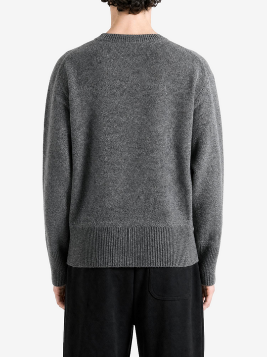 Grey knitwear, front view