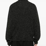 grey shirt worn by a person, showing the shirt fit