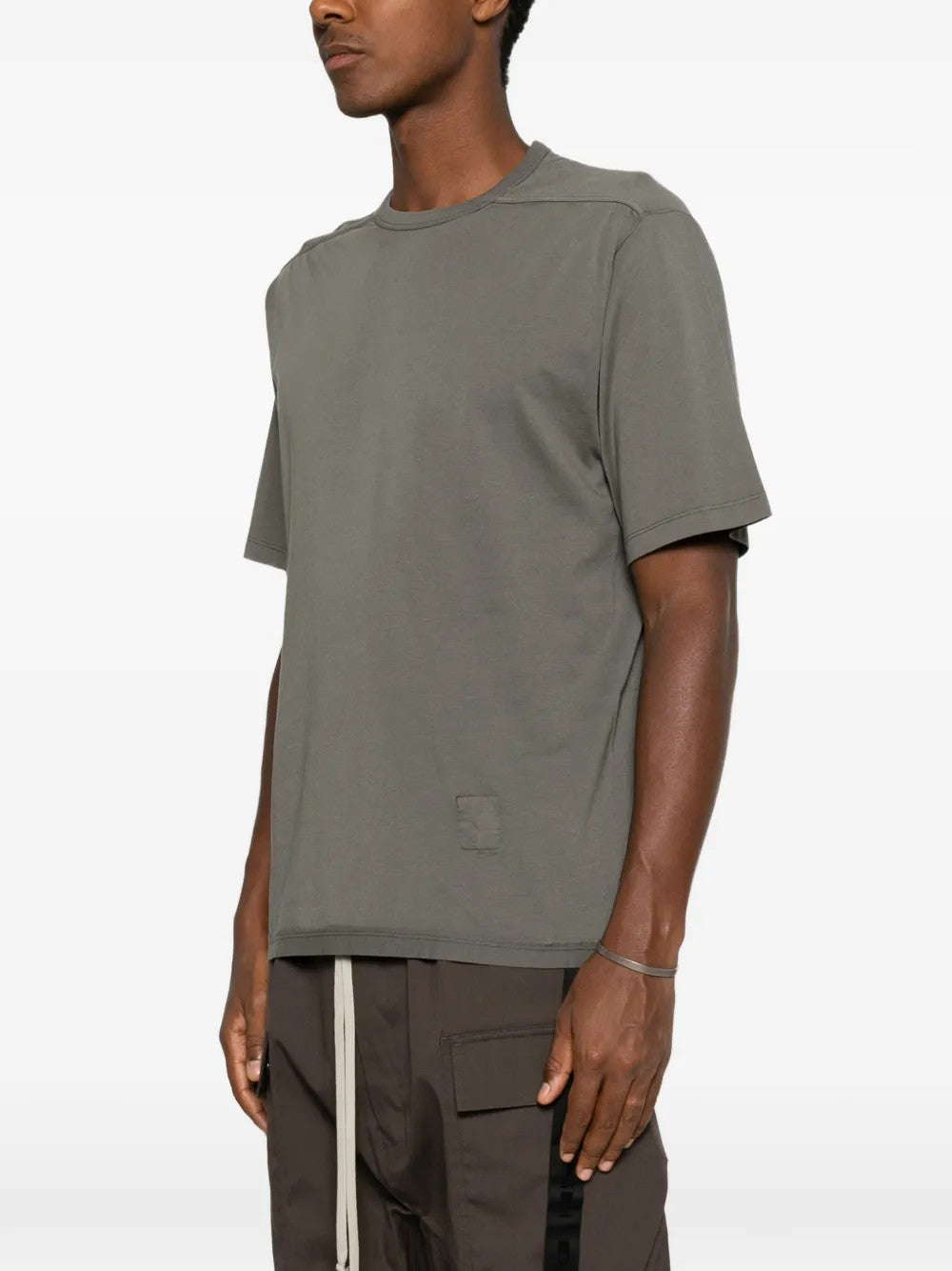 Grey t-shirt worn by a person, showing the t-shirt fit