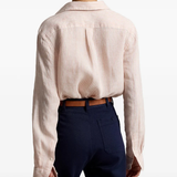Pink knitwear worn by a person, showing the knitwear fit