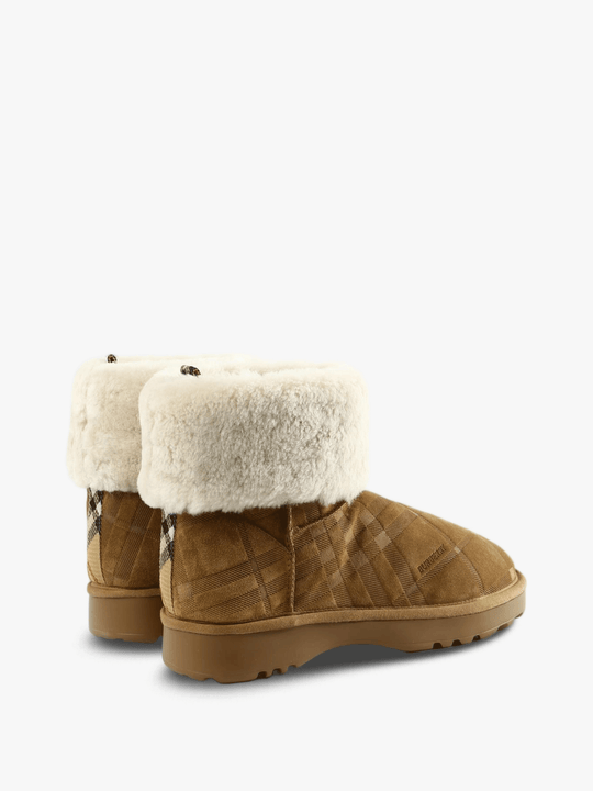 Brown boots, side view
