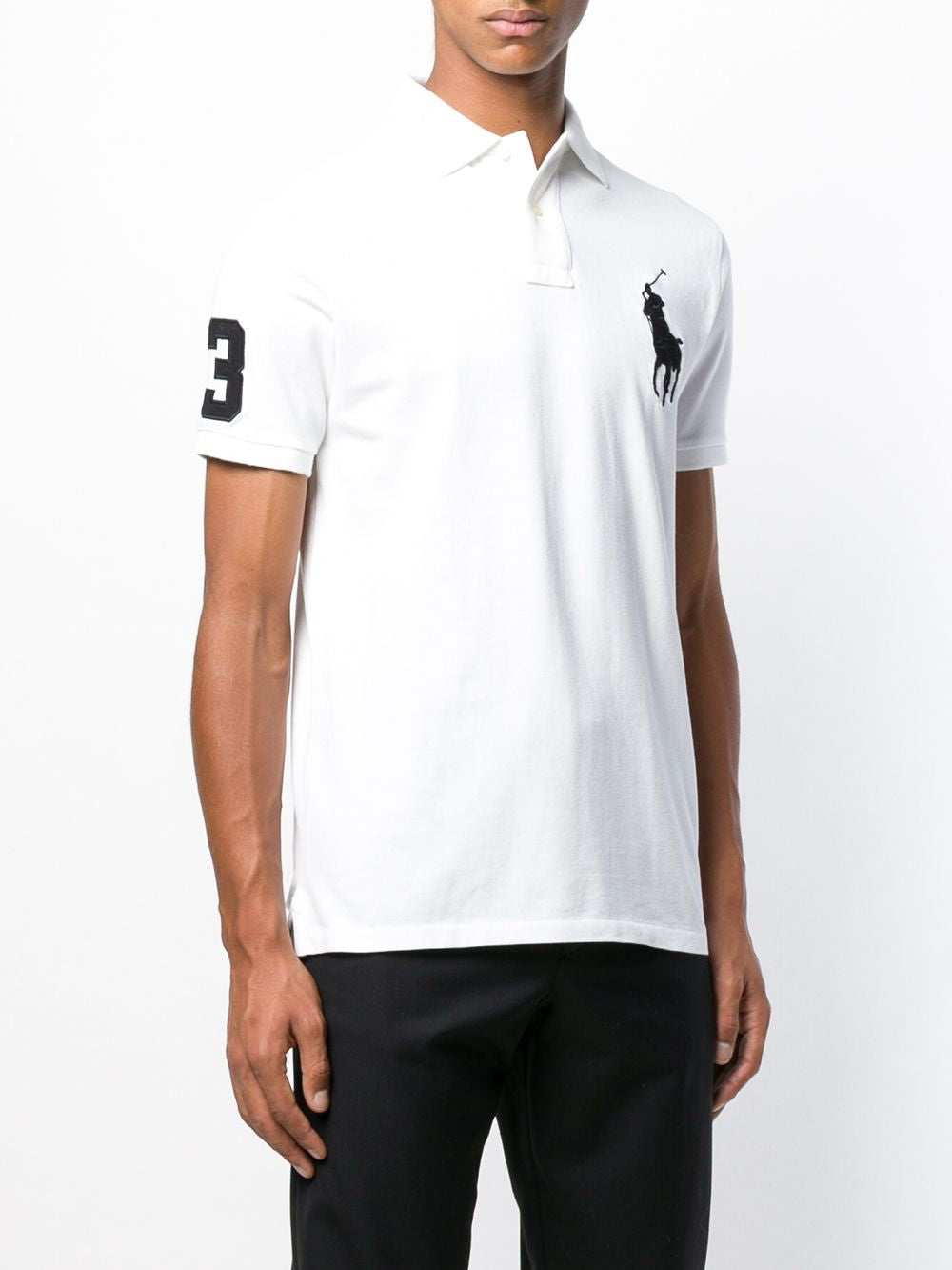 White shirt worn by a person, showing the shirt fit
