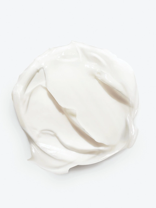 Close up of rich butter, showing texture of the argan oil ingredients