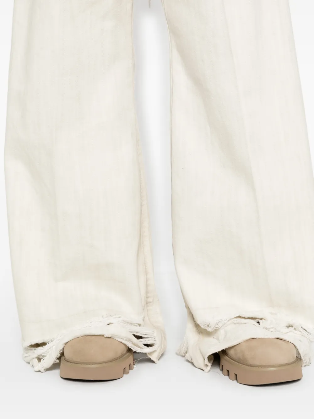 Close up of White pant, showing texture of the cotton fabric