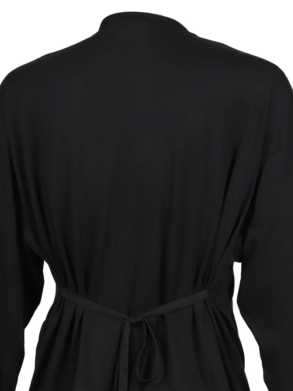 Black top worn by a person, showing the top fit