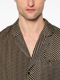 Close up of Brown and black striped jacket, showing texture of the viscose fabric