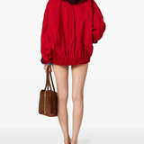 Red jacket, full body view