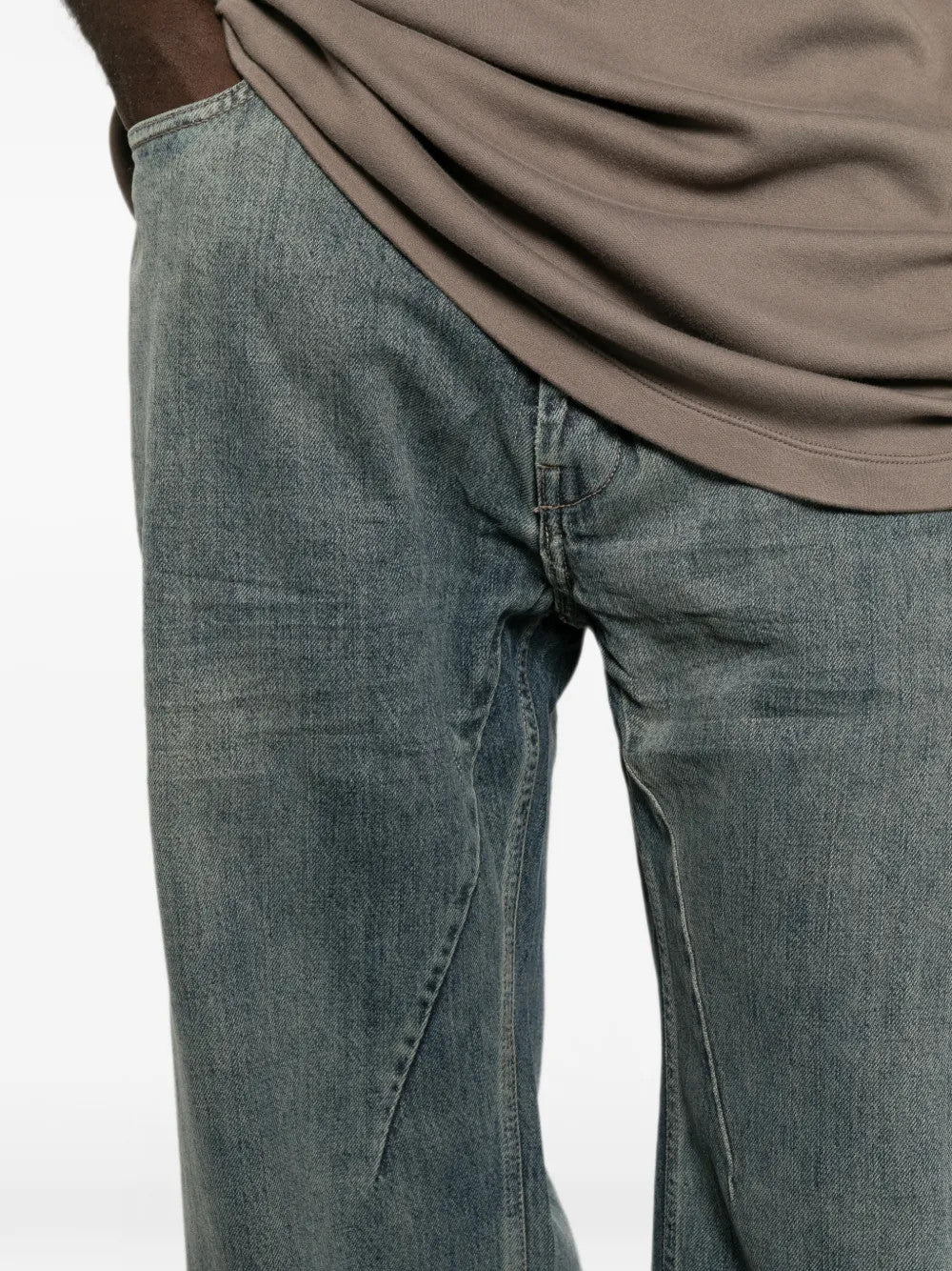 Blue pants worn by a person, showing the pants fit