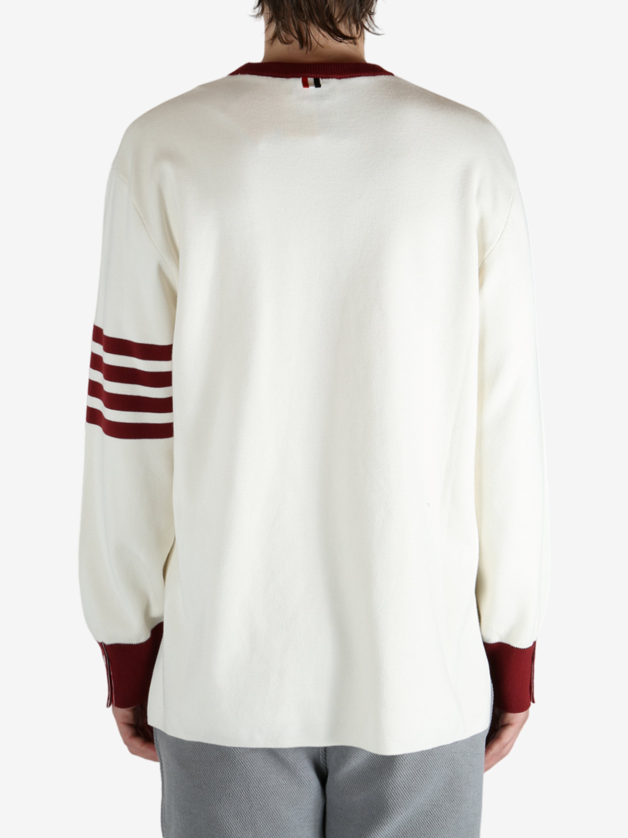 Tan shirts worn by a person, showing the shirts  fit