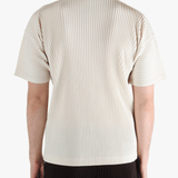 White t-shirt worn by a person, showing the t-shirt's fit
