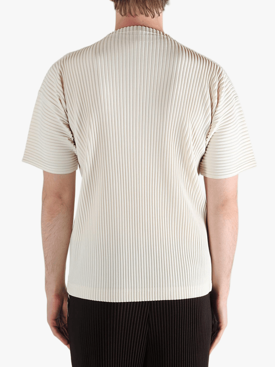 White t-shirt worn by a person, showing the t-shirt's fit