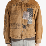 Brown jacket worn by a person, showing the jacket's fit