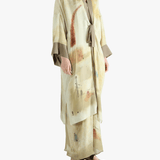 Tan top worn by a person, showing the top's fit