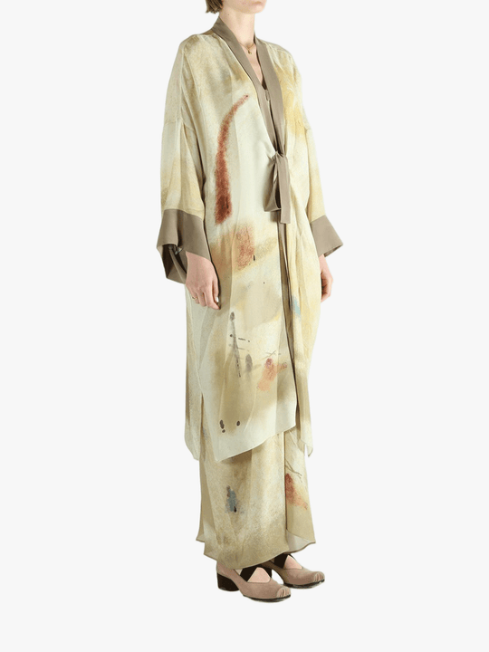 Tan top worn by a person, showing the top's fit